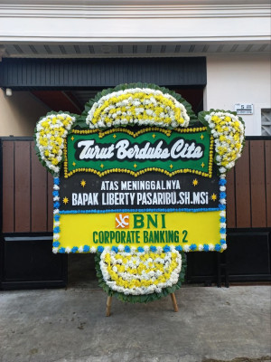 Papan Bunga Duka di Karu