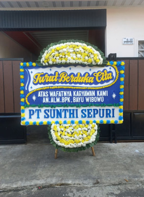 Papan Bunga Duka di Karu