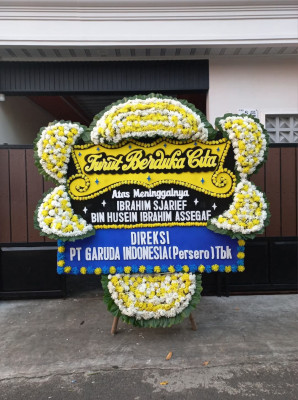 Papan Bunga Duka di Karu