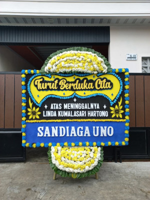 Papan Bunga Duka di Karu